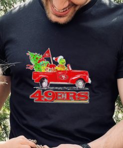 Happy Merry Christmas The Grinch drive a car San Francisco 49ers football logo flag gift hoodie, sweater, longsleeve, shirt v-neck, t-shirt