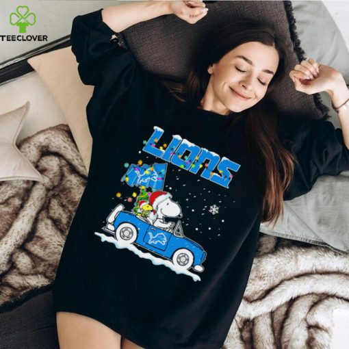 Happy Merry Christmas Snoopy drive a car Detroit Lions logo flag gift hoodie, sweater, longsleeve, shirt v-neck, t-shirt