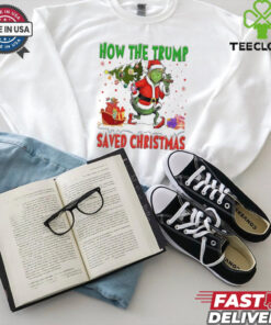 How The Trump Saved Christmas Funny Christmas Trump Shirt with a humorous, festive design featuring a playful take on the holiday season.