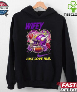 Hubby Wifey just love him her Minnesota Vikings helmet shirt