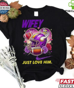 Hubby Wifey just love him her Minnesota Vikings helmet shirt