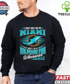 **I May Not Be in Miami, But I’m a Dolphins Fan Wherever I Am Shirt** – Show your unwavering support for the Miami Dolphins no matter where you are with this bold and passionate fan shirt!