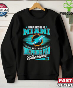 **I May Not Be in Miami, But I’m a Dolphins Fan Wherever I Am Shirt** – Show your unwavering support for the Miami Dolphins no matter where you are with this bold and passionate fan shirt!