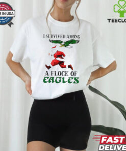 I Survived Among a Flock of Eagles Santa Run Christmas Shirt with a fun, festive design featuring Santa and a playful reference to the Eagles.