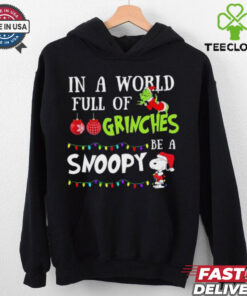 In A World Full Of Grinches Be A Snoopy Christmas 2024 Shirt