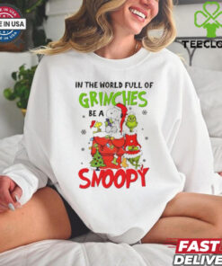 In a World Full of Grinches, Be a Snoopy Christmas Shirt festive holiday design featuring Snoopy as a positive, cheerful alternative to the Grinch