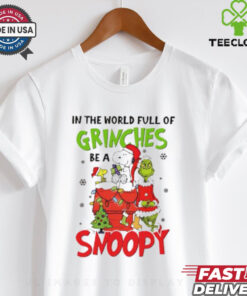 In a World Full of Grinches, Be a Snoopy Christmas Shirt festive holiday design featuring Snoopy as a positive, cheerful alternative to the Grinch