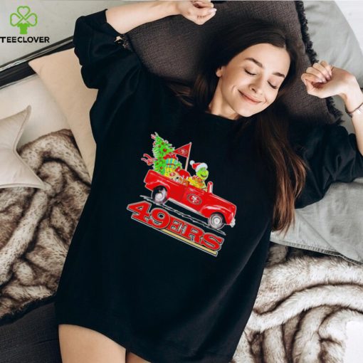 Happy Merry Christmas The Grinch drive a car San Francisco 49ers football logo flag gift hoodie, sweater, longsleeve, shirt v-neck, t-shirt