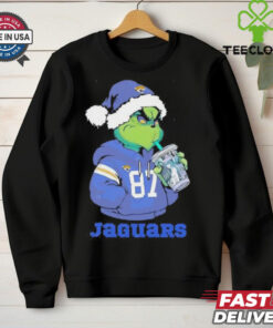 Jacksonville Jaguars Grinch Santa drinking Eras Tour cup shirt