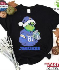 Jacksonville Jaguars Grinch Santa drinking Eras Tour cup shirt