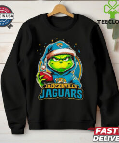 Jacksonville Jaguars Grinch wearing Santa hat Christmas 2024 shirt