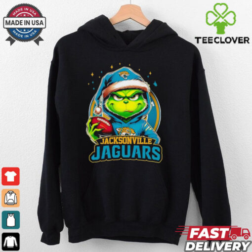 Jacksonville Jaguars Grinch wearing Santa hat Christmas 2024 shirt