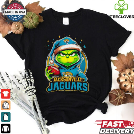 Jacksonville Jaguars Grinch wearing Santa hat Christmas 2024 shirt