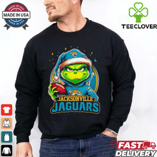 Jacksonville Jaguars Grinch wearing Santa hat Christmas 2024 shirt