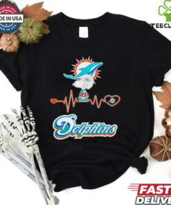 Miami Dolphins x Snoopy Player Heartbeat Shirt, featuring a fun and stylish design that combines the Miami Dolphins logo and Snoopy in a heartwarming graphic. Perfect for fans who love both the Dolphins and the Peanuts character, celebrating their passion for the team with a playful twist.
