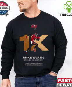 Mike Evans Tampa Bay Buccaneers Etched In History 1K Receiving Yards In His First 11 Seasons Unisex T-Shirt with a commemorative design celebrating Evans’ remarkable achievement of 1,000 receiving yards in each of his first 11 seasons, perfect for Buccaneers fans.
