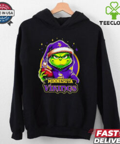 Minnesota Vikings Grinch wearing Santa hat Christmas 2024 shirt