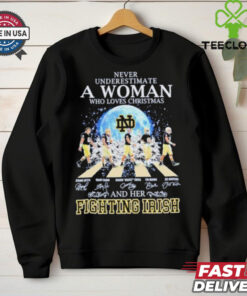 Never Underestimate A Woman Who Loves Christmas And Her Notre Dame Fighting Irish Abbey Road Signatures Shirt