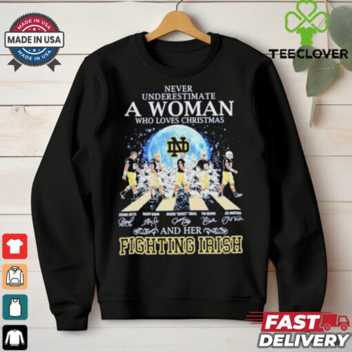 Never Underestimate A Woman Who Loves Christmas And Her Notre Dame Fighting Irish Abbey Road Signatures Shirt