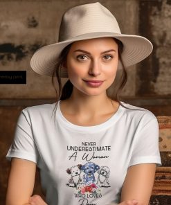 Never Underestimate a woman who loves dogs and was born in december shirt