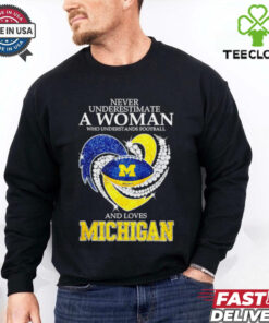 Never underestimate a woman and love Michigan heart shirt