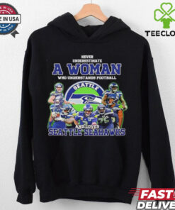 Never underestimate a woman who understand football and loves Seattle Seahawks shirt 2 Never underestimate a woman who understand football and loves Seattle Seahawks shirt