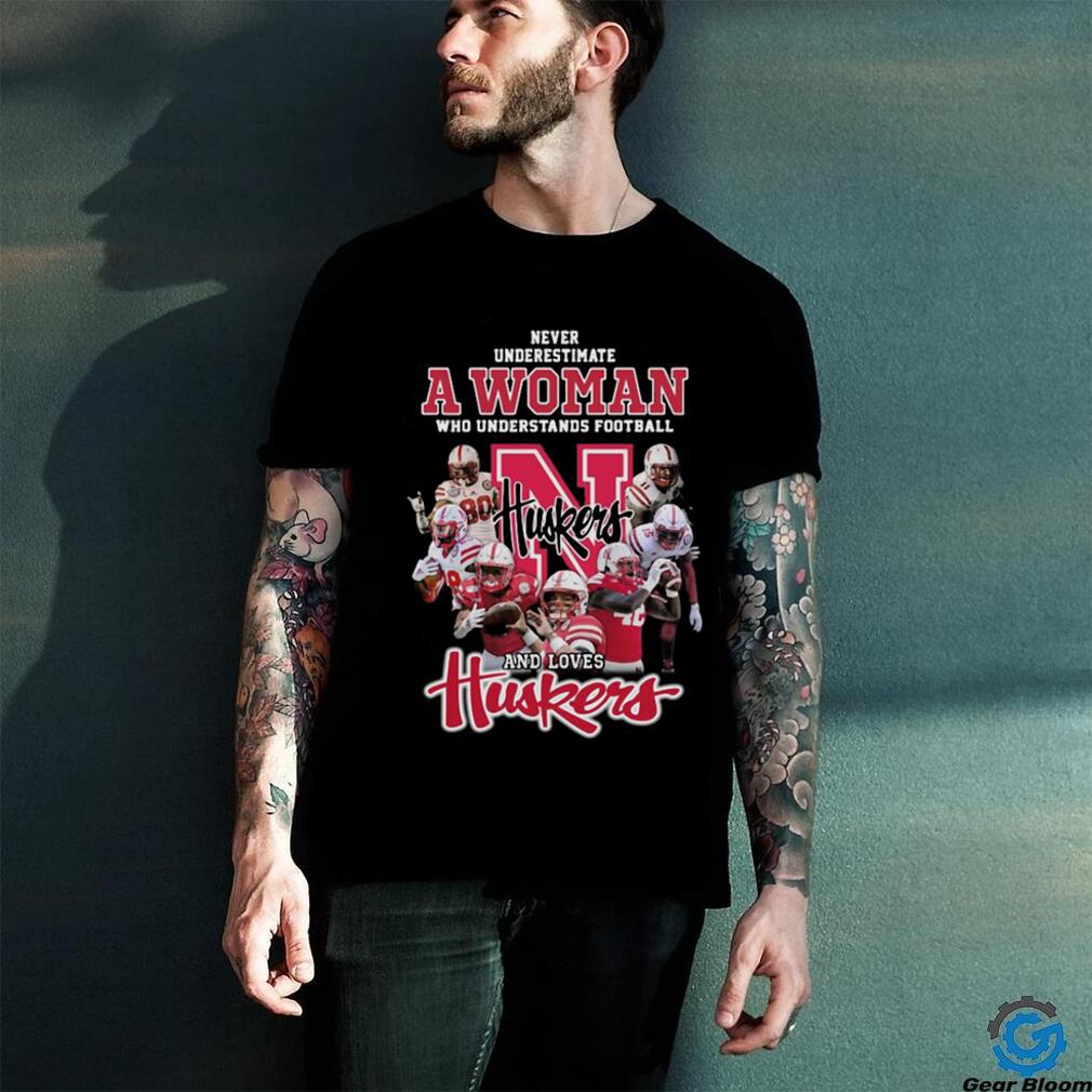 Never underestimate a woman who understands football and loves Nebraska Corn Huskers shirt Never underestimate a woman who understands football and loves Nebraska Corn Huskers shirt