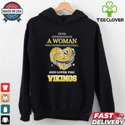 Never underestimate a woman who understands football and loves the Minnesota Vikings rhinestone heart 2024 shirt