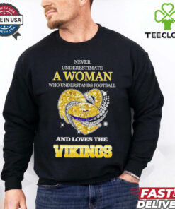 Never underestimate a woman who understands football and loves the Minnesota Vikings rhinestone heart 2024 shirt