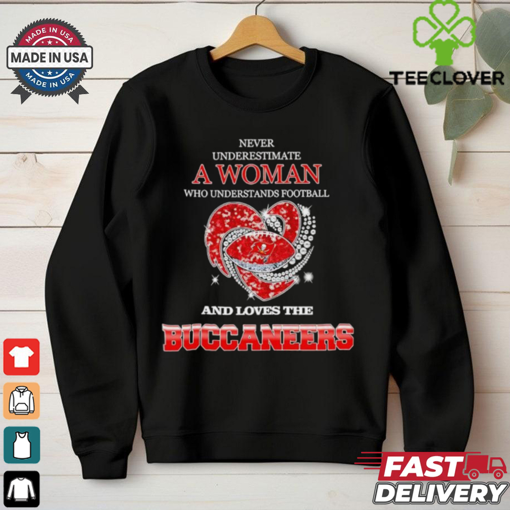 Never underestimate a woman who understands football and loves the Tampa Bay Buccaneers rhinestone heart 2024 shirt Never underestimate a woman who understands football and loves the Tampa Bay Buccaneers rhinestone heart 2024 shirt