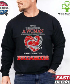 Never underestimate a woman who understands football and loves the Tampa Bay Buccaneers rhinestone heart 2024 shirt