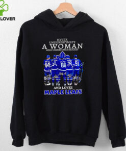 Never underestimate a woman who understands hockey and loves Maple Leafs signatures shirt