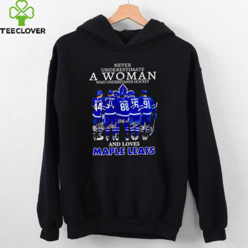 Never underestimate a woman who understands hockey and loves Maple Leafs signatures shirt