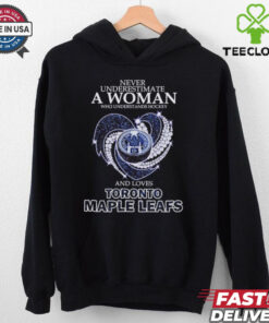 Never underestimate a woman who understands hockey and loves Toronto Maple Leafs shirt