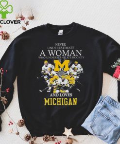 Never underestimate a woman who understands ice hockey and loves michigan wolverines shirt
