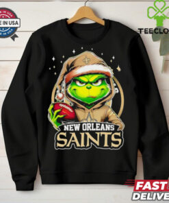 New Orleans Saints Grinch wearing Santa hat Christmas 2024 shirt