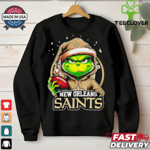 New Orleans Saints Grinch wearing Santa hat Christmas 2024 shirt