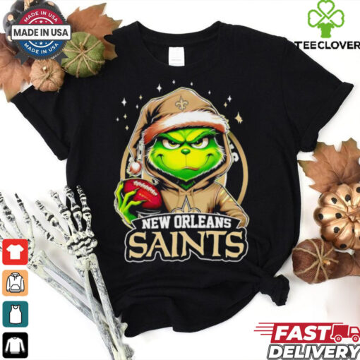 New Orleans Saints Grinch wearing Santa hat Christmas 2024 shirt