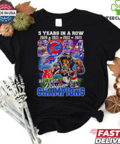 The **Official 5 Years in a Row Buffalo Bills 2024 AFC East Division Champions Mascot Shirt** celebrates the Buffalo Bills' impressive achievement of winning the AFC East Division for five consecutive years. Featuring the team mascot, this shirt is a must-have for dedicated Bills fans to commemorate their team's continued dominance in the division!
