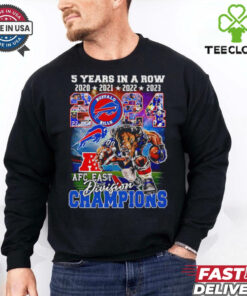 The **Official 5 Years in a Row Buffalo Bills 2024 AFC East Division Champions Mascot Shirt** celebrates the Buffalo Bills' impressive achievement of winning the AFC East Division for five consecutive years. Featuring the team mascot, this shirt is a must-have for dedicated Bills fans to commemorate their team's continued dominance in the division!