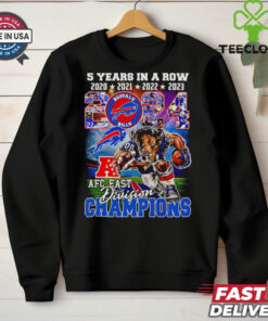 The **Official 5 Years in a Row Buffalo Bills 2024 AFC East Division Champions Mascot Shirt** celebrates the Buffalo Bills' impressive achievement of winning the AFC East Division for five consecutive years. Featuring the team mascot, this shirt is a must-have for dedicated Bills fans to commemorate their team's continued dominance in the division!
