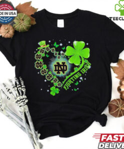 The **Official Clover Heart Notre Dame Fighting Irish Shirt** combines team pride with a unique clover heart design. Perfect for fans of the Fighting Irish who want to showcase their love for the team in a stylish and meaningful way!