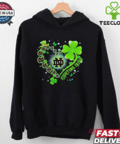The **Official Clover Heart Notre Dame Fighting Irish Shirt** combines team pride with a unique clover heart design. Perfect for fans of the Fighting Irish who want to showcase their love for the team in a stylish and meaningful way!