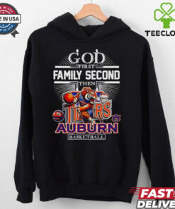 The **Official God First, Family Second, Then Auburn Basketball Mascot Shirt** features a powerful message of priorities alongside the Auburn basketball mascot. Perfect for fans who want to show their faith, family values, and dedication to the Auburn Tigers basketball team!