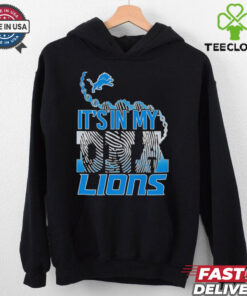 The **Official It’s in My DNA Lions Fingerprint Shirt** features a unique design with a fingerprint pattern incorporating the Detroit Lions logo, symbolizing deep-rooted team pride. A perfect shirt for fans to show their unwavering loyalty and connection to the Lions!