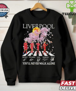 Official Liverpool – You'll Never Walk Alone Signature Unisex T-Shirt with a powerful design featuring the iconic slogan and player signatures, perfect for Liverpool fans.