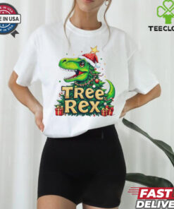 Official Merry Christmas Treerex 2024 Shirt with a fun, festive design featuring a dinosaur and Christmas tree elements.