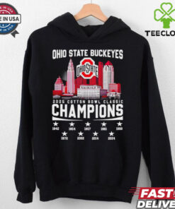The **Official Ohio State Buckeyes 2025 Cotton Bowl Classic Champions 9-Time Skyline Shirt** celebrates Ohio State's victory in the 2025 Cotton Bowl Classic. Featuring the team’s achievement as 9-time champions and a striking skyline design, this shirt is perfect for Buckeyes fans looking to commemorate their team’s success in the iconic bowl game!
