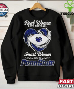 The **Official Real Women Love Football, Smart Women Love the Penn State Nittany Lions Heart Shirt** combines a playful and empowering message with team pride. Featuring a heart design and bold lettering, this shirt is perfect for fans who love football and want to show their loyalty to the Penn State Nittany Lions!