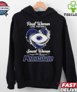 The **Official Real Women Love Football, Smart Women Love the Penn State Nittany Lions Heart Shirt** combines a playful and empowering message with team pride. Featuring a heart design and bold lettering, this shirt is perfect for fans who love football and want to show their loyalty to the Penn State Nittany Lions!